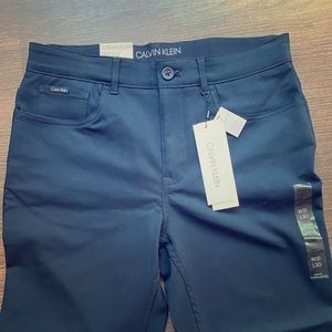 Calvin Klein dark blue dress pants, never worn NWT